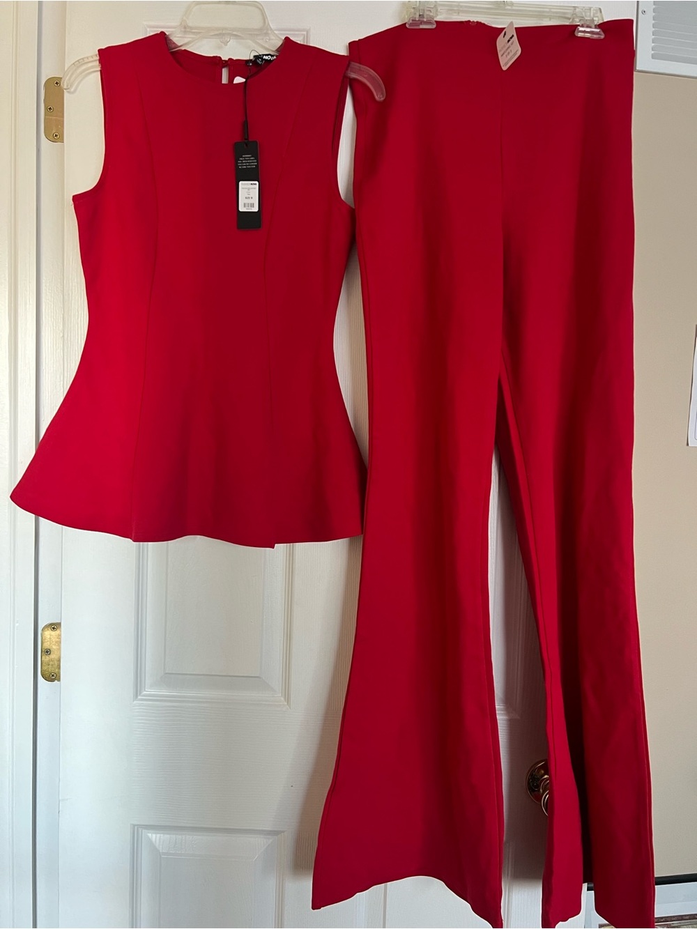 Red Sleeveless Peplum Top & Flared Pants Set